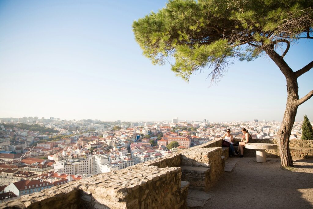 couple-enjoying-a-scenic-view-of-the-city of lisbon