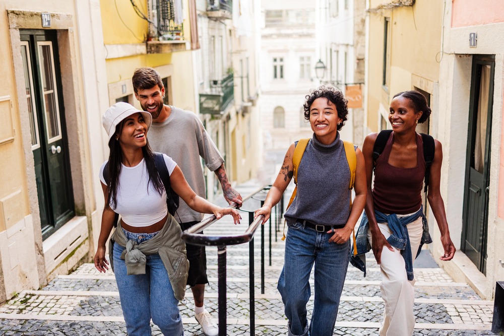 happy-tourists-walking-down-the-stairs-in-lisbon
