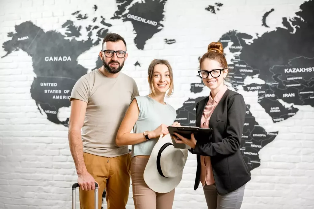 couple-with-travel-agent-at-the-office-2025