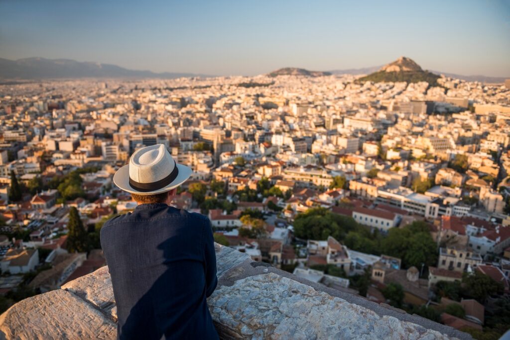 tourist-man-looking-at-view-over-athens-from-likav